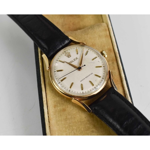 371 - A 1950s 9ct gold Rolex gentlemans wristwatch, the champagne dial wiht gilt baton markes and Rolex em... 