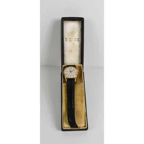 371 - A 1950s 9ct gold Rolex gentlemans wristwatch, the champagne dial wiht gilt baton markes and Rolex em... 