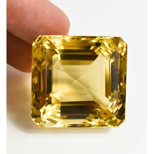 39 - A large loose asscher cut citrine 24g, 30 by 30 by 23mm deep.