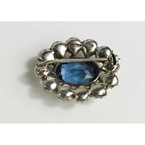 4 - A silver and paste set brooch, hallmarked London 1952, 0.45toz.