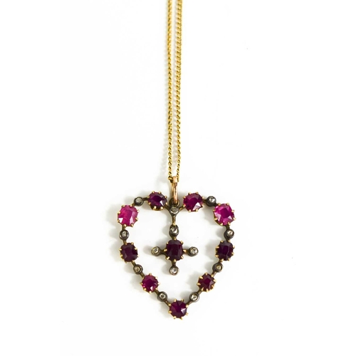 41 - A 19th century 9ct gold, pink ruby and diamond heart form pendant and chain, the heart set with rubi... 