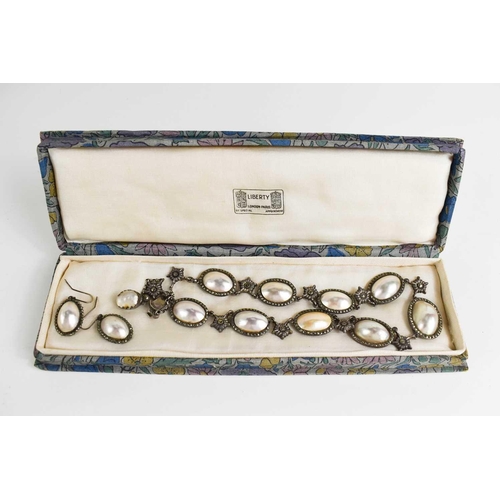 43 - An early Victorian silver and pearl pendant and earring set, in a Liberty vintage presentation box.