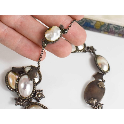 43 - An early Victorian silver and pearl pendant and earring set, in a Liberty vintage presentation box.