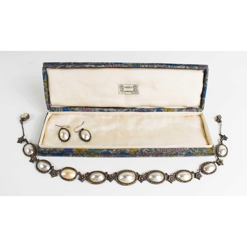 43 - An early Victorian silver and pearl pendant and earring set, in a Liberty vintage presentation box.