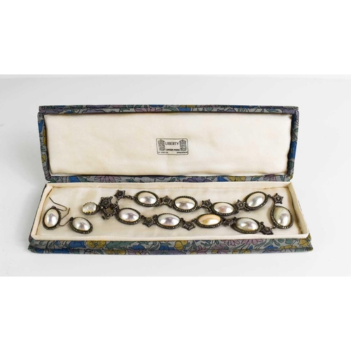 43 - An early Victorian silver and pearl pendant and earring set, in a Liberty vintage presentation box.