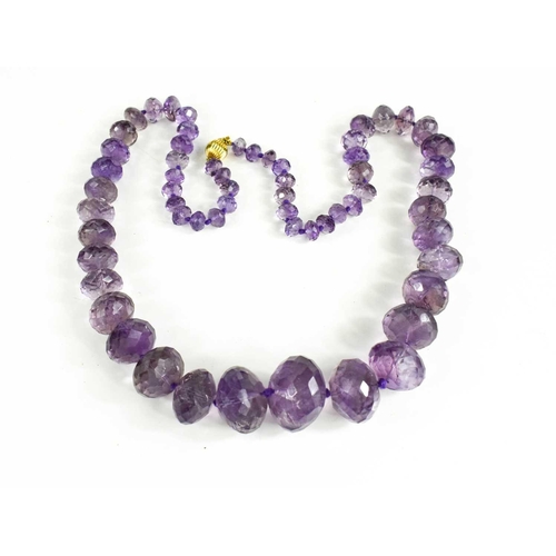 45 - A Victorian amethyst beaded necklace with 9ct gold clasp, composed of faceted graduated beads.