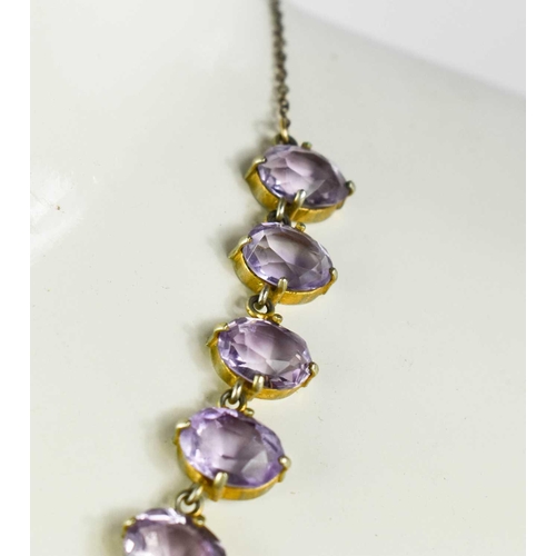 47 - A Georgian gilt metal and amethyst necklace, composed of oval cut amethysts, 20.90g.