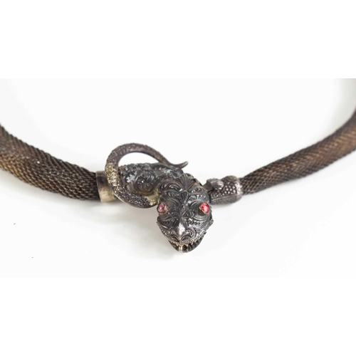 53 - A silver 19th century chain metal 'expandable' necklace, with a snake head clasp inset with small ru... 