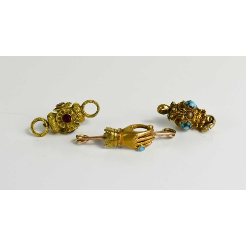 55 - A Georgian gold and turquoise bar brooch, in the form of a hand with turqouise set ring together wit... 