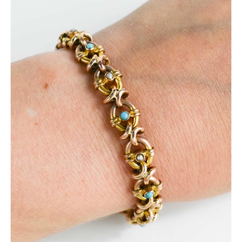 60 - A 9ct gold bracelet, the oval links set with turquoise and seed pearls, with safety chain, 12g, 18cm... 