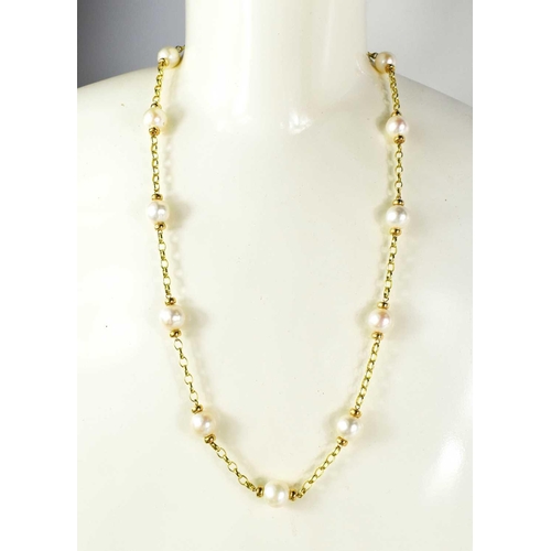 7 - A 9ct gold and pearl necklace, each pearl united by chain form links, 33g.