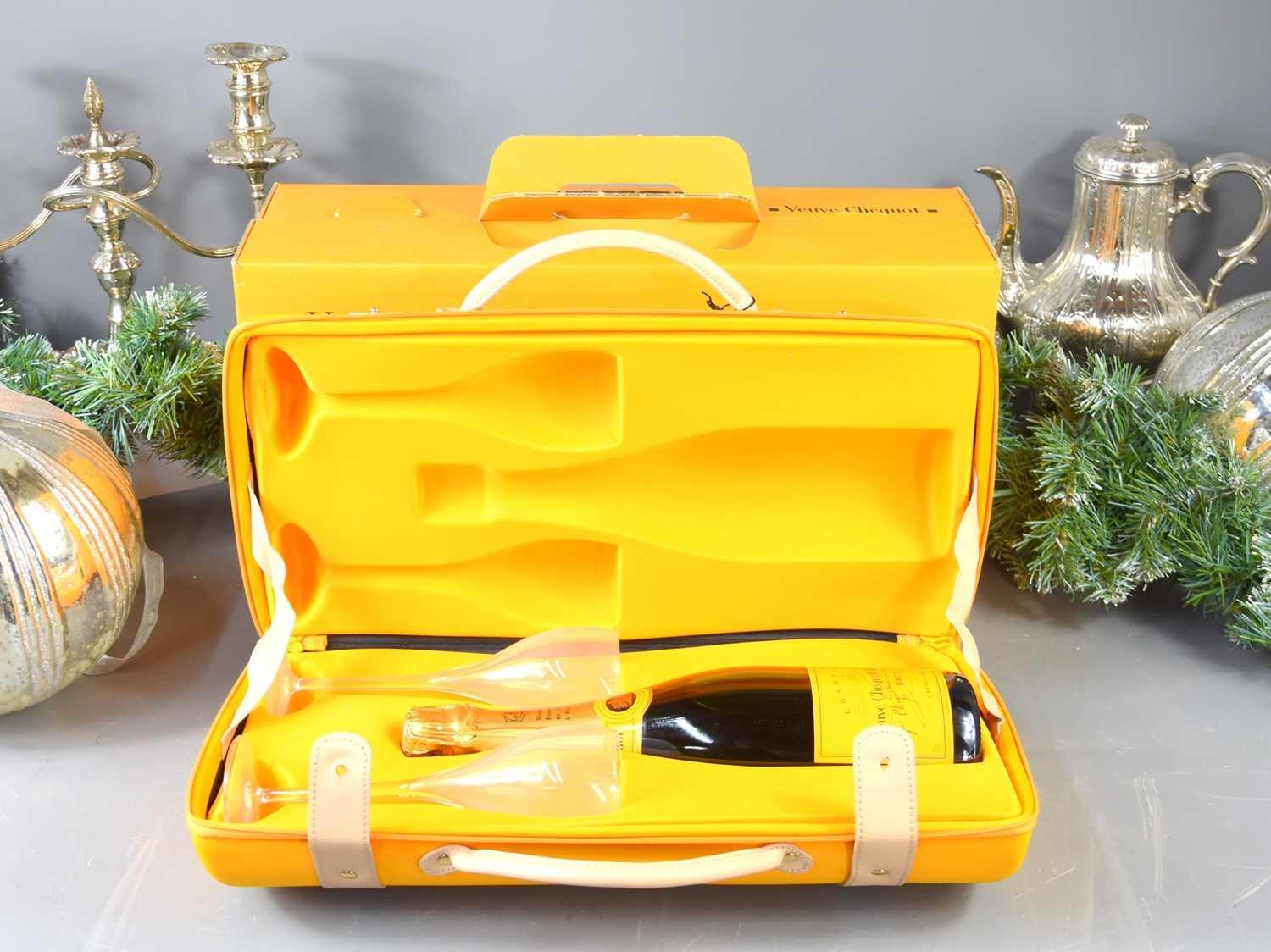 A Veuve Clicquot Champagne picnic set, comprising a bottle of Veuve