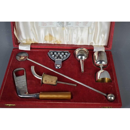 113 - A silver plated vintage Cocktail making set, together with mixing plaque, in the original presentati... 