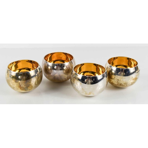 116 - Barry Thomas, four silver tumblers, with gilded interiors, London 2004, each 3.3toz, 13.2toz total. ... 