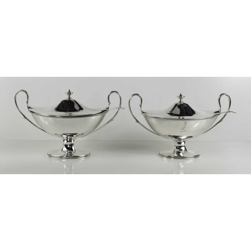 118 - A pair of fine Georgian silver sauce tureens and ladels, London 1785 by Thomas Daniell, of elegant b... 