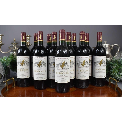 30 - Twelve bottles of Chateau La Becasse, Pauillac, Grand Vin De Bordeaux, France, 1995, 750ml.