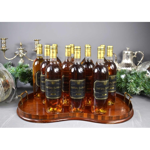 32 - Twelve bottles of bottles of Chateau Guiraud, 1er Cru Sauternes, 1997, 750ml.