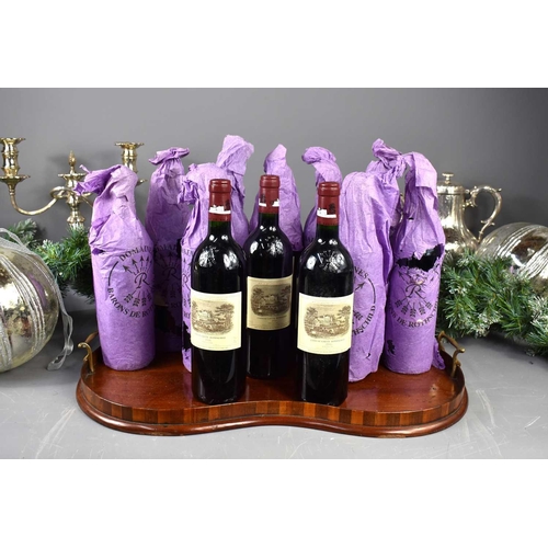 57 - Twelve bottles of Chateau Lafite Rothschild red wine, Pauillac, 1996, 750ml.