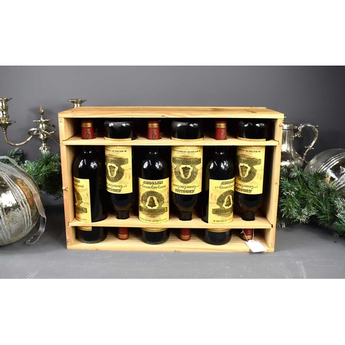 63 - A case of twelve bottles of Chateau Angelus, 1er Grand Cru Classe, St Emilion 1998, 750ml.