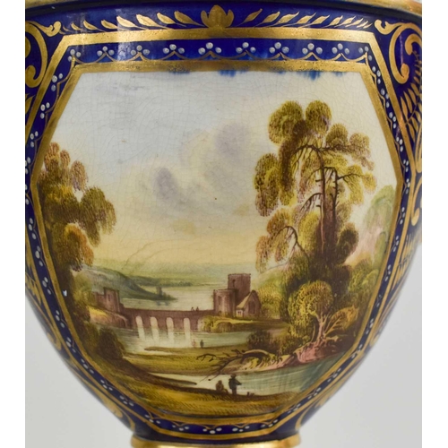 129 - A Derby 19th century twin handled vase, painted with a Welsh view, with gilded scrollwork, cobalt bl... 