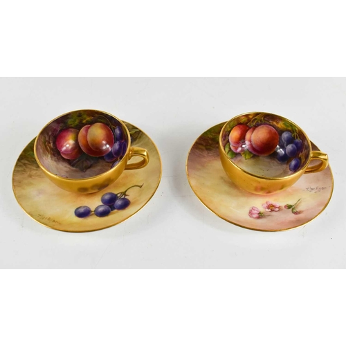 131 - A pair of Royal Worcester miniature cups and saucers, painted with fruits to mossy ground, puce mark... 