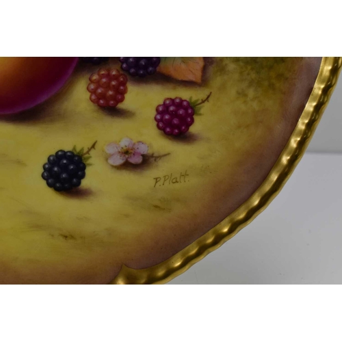 148 - A fine Royal Worcester plate, painted with apples, blackberries, red berries, flowers and autumn lea... 