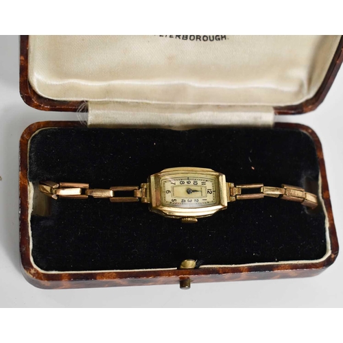 35 - A 1930s rolled gold Medana ladies wristwatch, with a mother of pearl Arabic dial, and chain link str... 