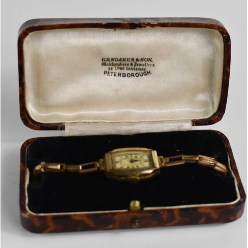 35 - A 1930s rolled gold Medana ladies wristwatch, with a mother of pearl Arabic dial, and chain link str... 