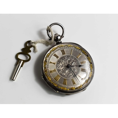 36 - A 19th century silver pocket watch, with a silvered engraved dial, gilt Roman numerals and decorativ... 