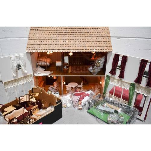 361 - A six bedroom doll's house, complete with garden, electrics, dolls, furniture and accessories and va... 