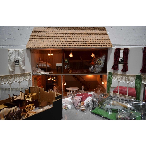 361 - A six bedroom doll's house, complete with garden, electrics, dolls, furniture and accessories and va... 