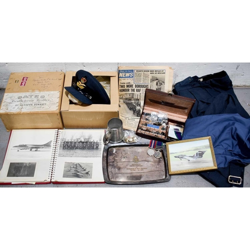 394 - A collection of RAF memorabilia to Squadron Leader PH Philip RAF, including cap from Bates Gentlemen... 