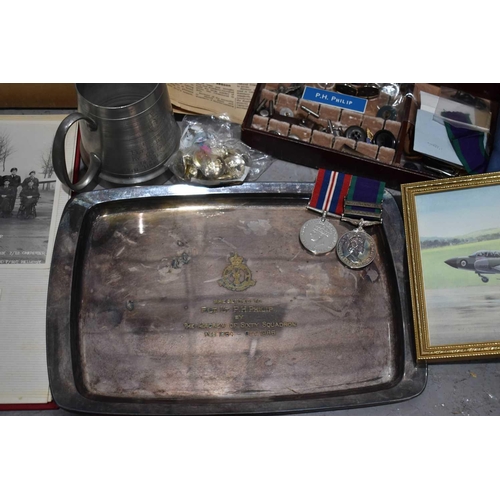 394 - A collection of RAF memorabilia to Squadron Leader PH Philip RAF, including cap from Bates Gentlemen... 