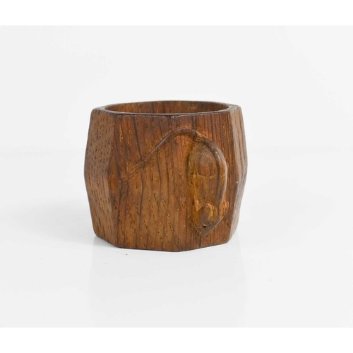 405 - A pair of Robert Thompson Mouseman ashtrays, and a napkin ring, each carved with a signature mouse.