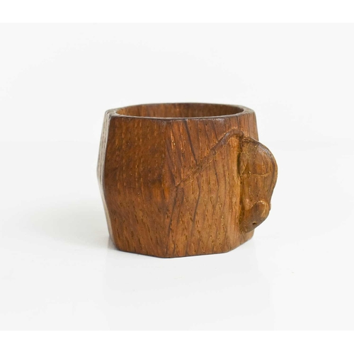 405 - A pair of Robert Thompson Mouseman ashtrays, and a napkin ring, each carved with a signature mouse.