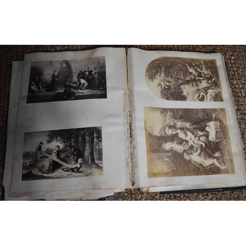 418 - A very large late Victorian scrapbook, filled with prints of various works of art and places, with h... 