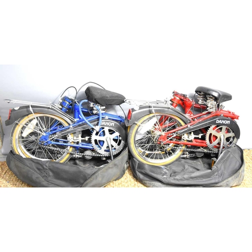 520 - Two Dahon folding bicycles with original carry bags.