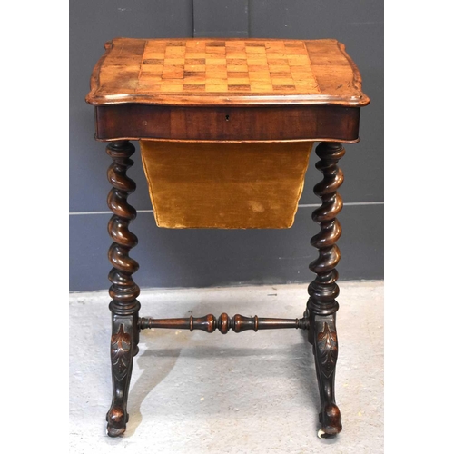 531 - A Victorian mahogany games/work table, the rectangular top with a satinwood and rosewood chess board... 