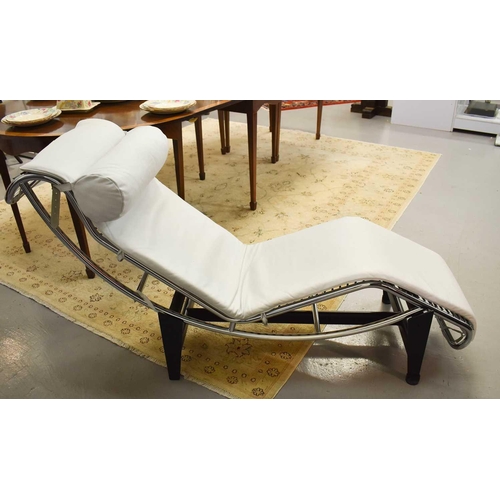 533 - A Le Corbusier style white leather chaise longue, with polished chrome frame base / stand.