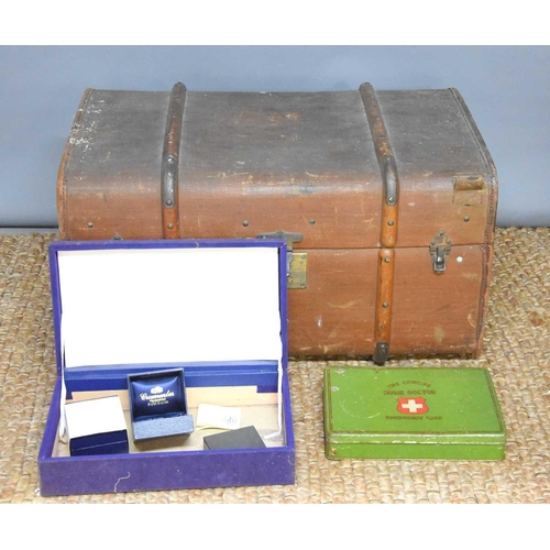 547 - A vintage leather bound steamer trunk together with a vintage first aid tin and some jewellery boxes... 