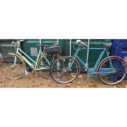 548 - A vintage policemans bicycle and a ladies Raleigh bike.