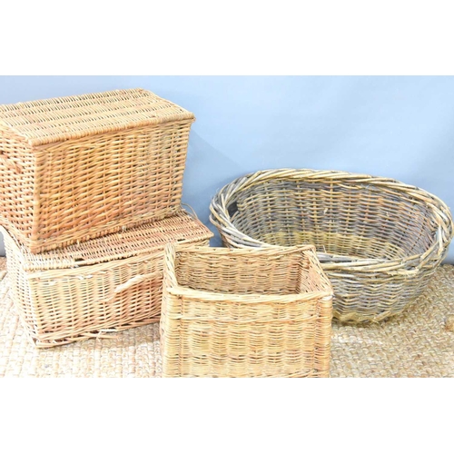 559 - A vintage wicker oval basket together with two wicker picnic baskets and a small log basket.