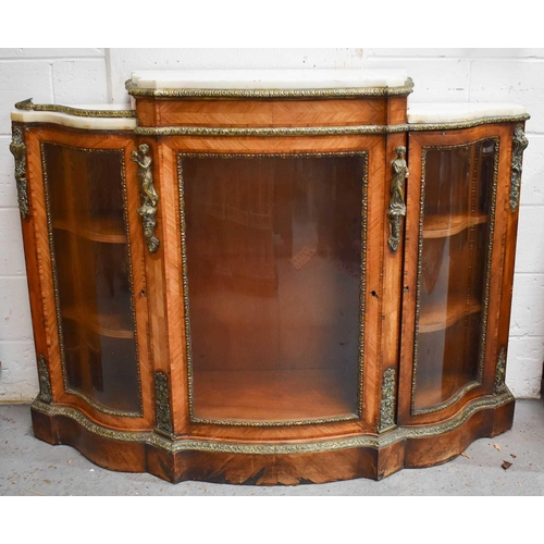 582 - A French 19th century walnut, ormolu and marble topped credenza, with shaped bow front, central glaz... 