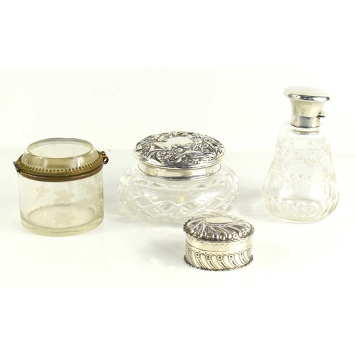 68 - Two silver topped dressing table bottles together with a Victorian silver snuff / trinket box with e... 