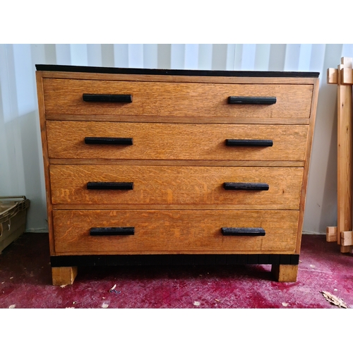 550A - An Art Deco period oak chest of drawers.