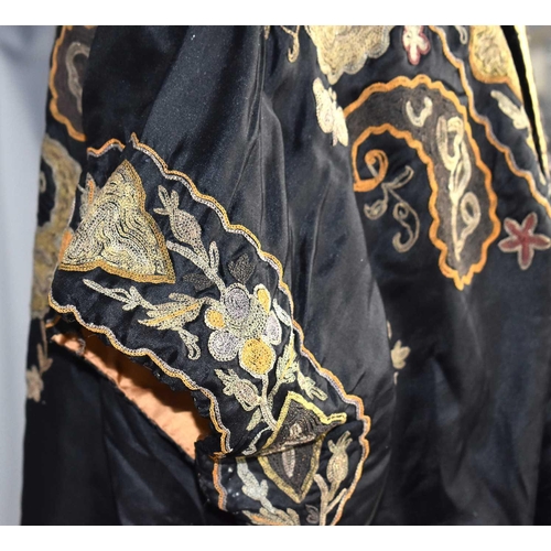 1 - A vintage early 20th century Chinese silk robe, the background embroidered with metallic threads thr... 