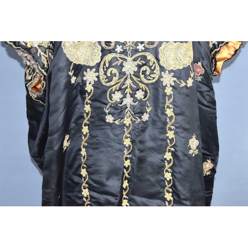 1 - A vintage early 20th century Chinese silk robe, the background embroidered with metallic threads thr... 