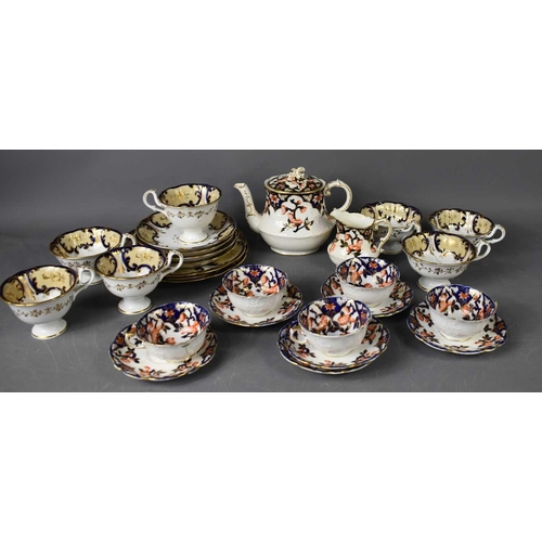 135 - An Aynsley part tea service, Rd number 222022, comprising tea pot, six cups and saucers and milk jug... 