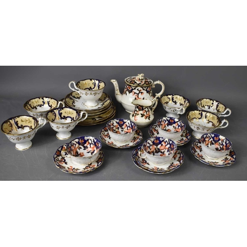 135 - An Aynsley part tea service, Rd number 222022, comprising tea pot, six cups and saucers and milk jug... 