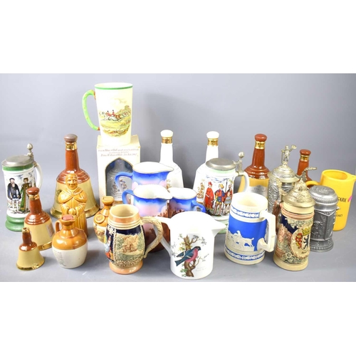 150 - A group of Bells whisky decanters together with various tankards and jugs to include Portmeirion, 19... 